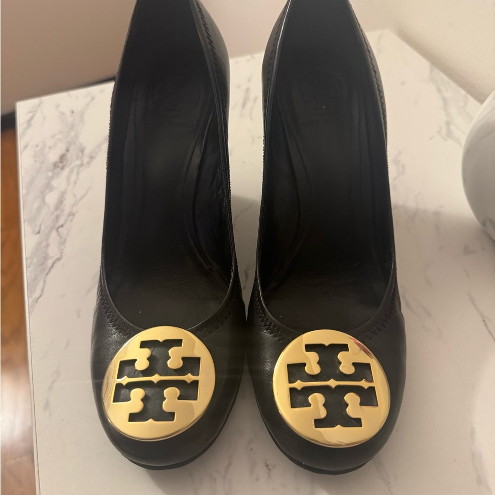 Tory Burch Black Wedges with Gold Emblem
3” Wedge heel. 
In perfect condition!